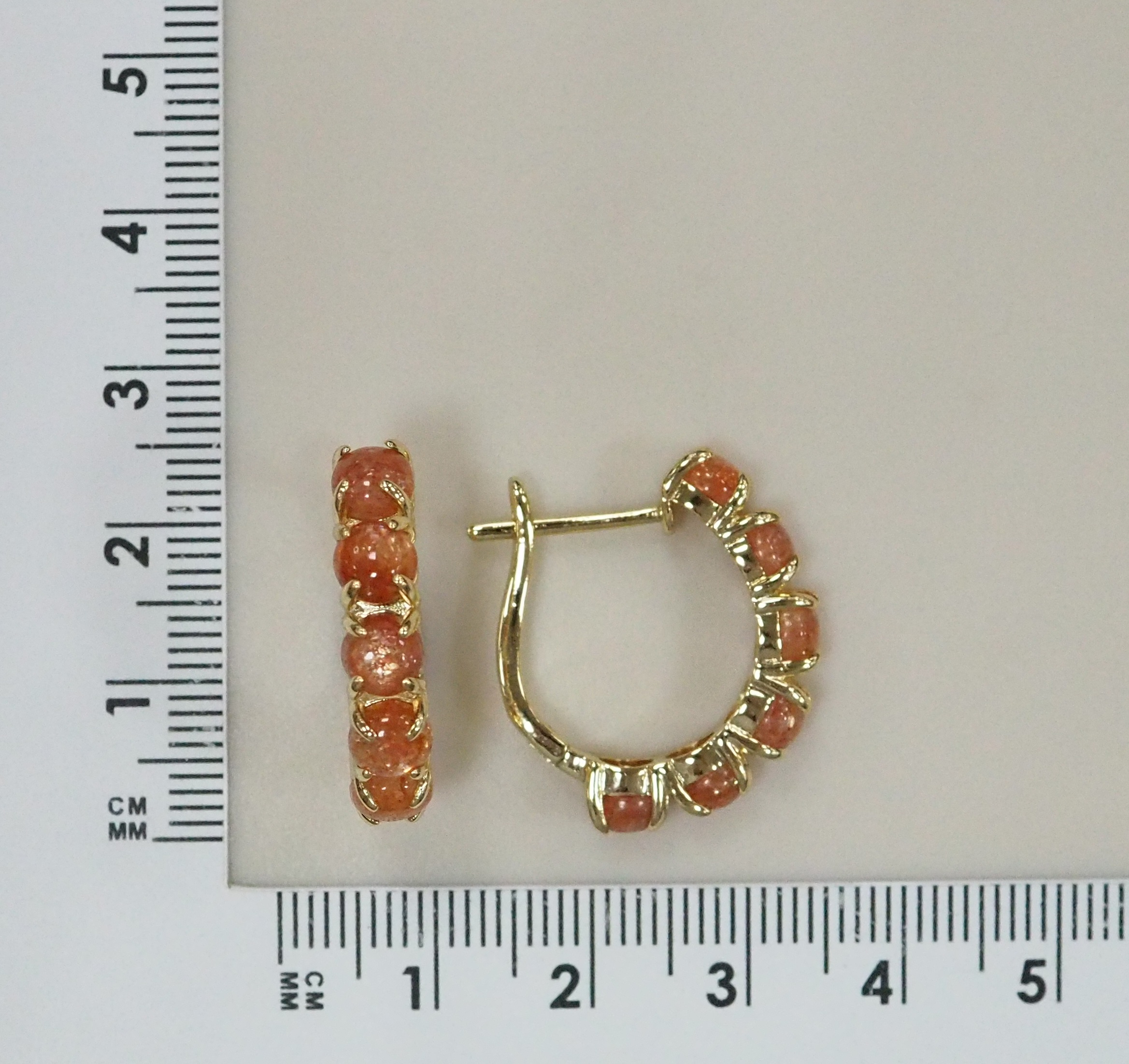 Серебряные серьги с солнечными камнями